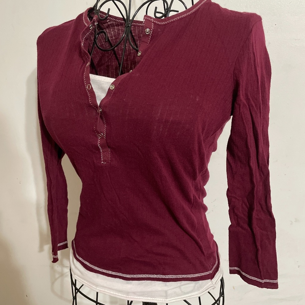 Wine berry long sleeve top with a little white under shirt
